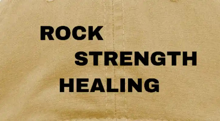 Rock Strength Healing text on beige fabric background