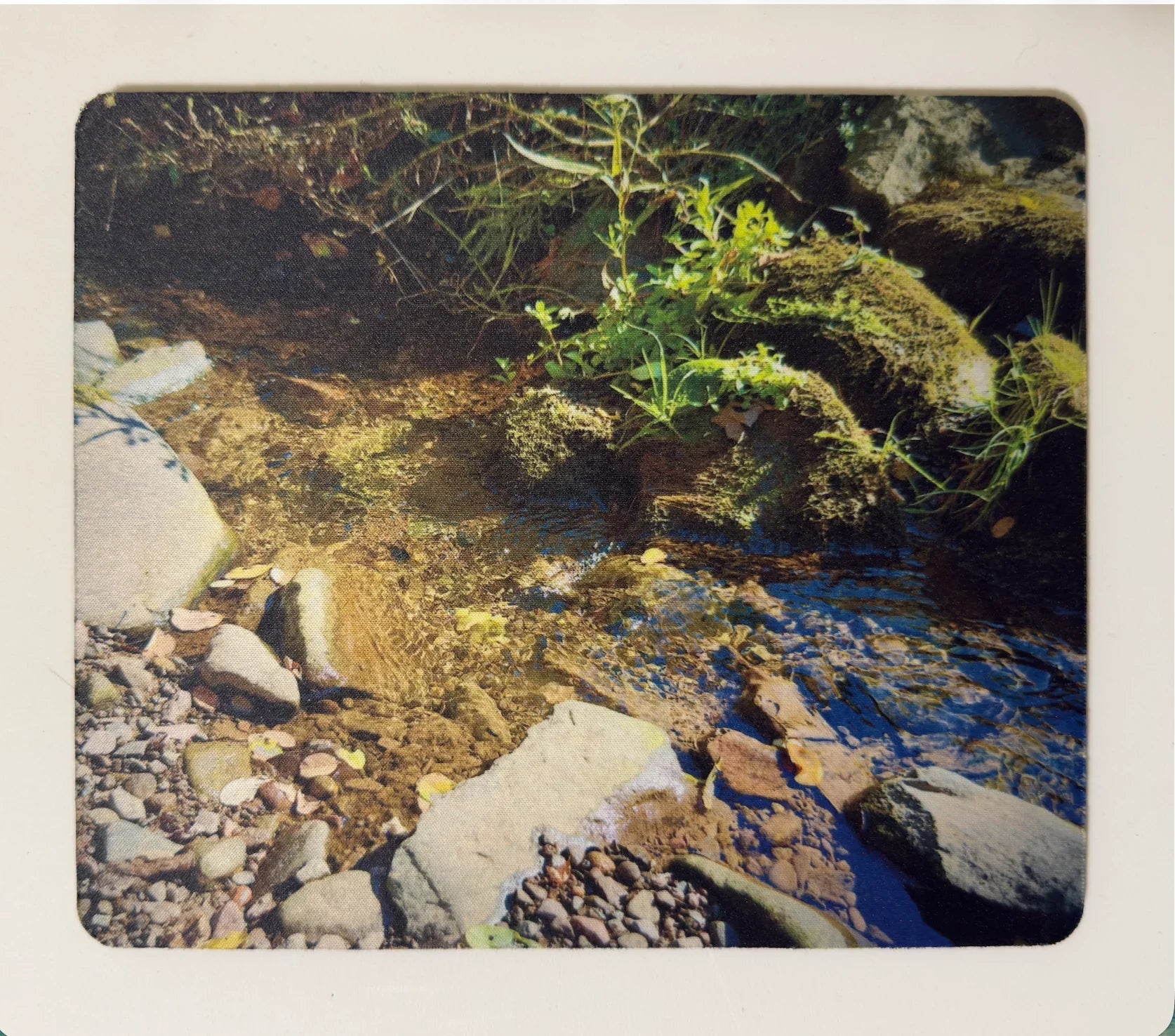 Picture of a mouse pad with a stream