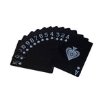Black playing cards with blue text and symbols on a white background