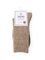 Ribbed brown socks on hanger with 'SOCKS' tag, cozy winter footwear