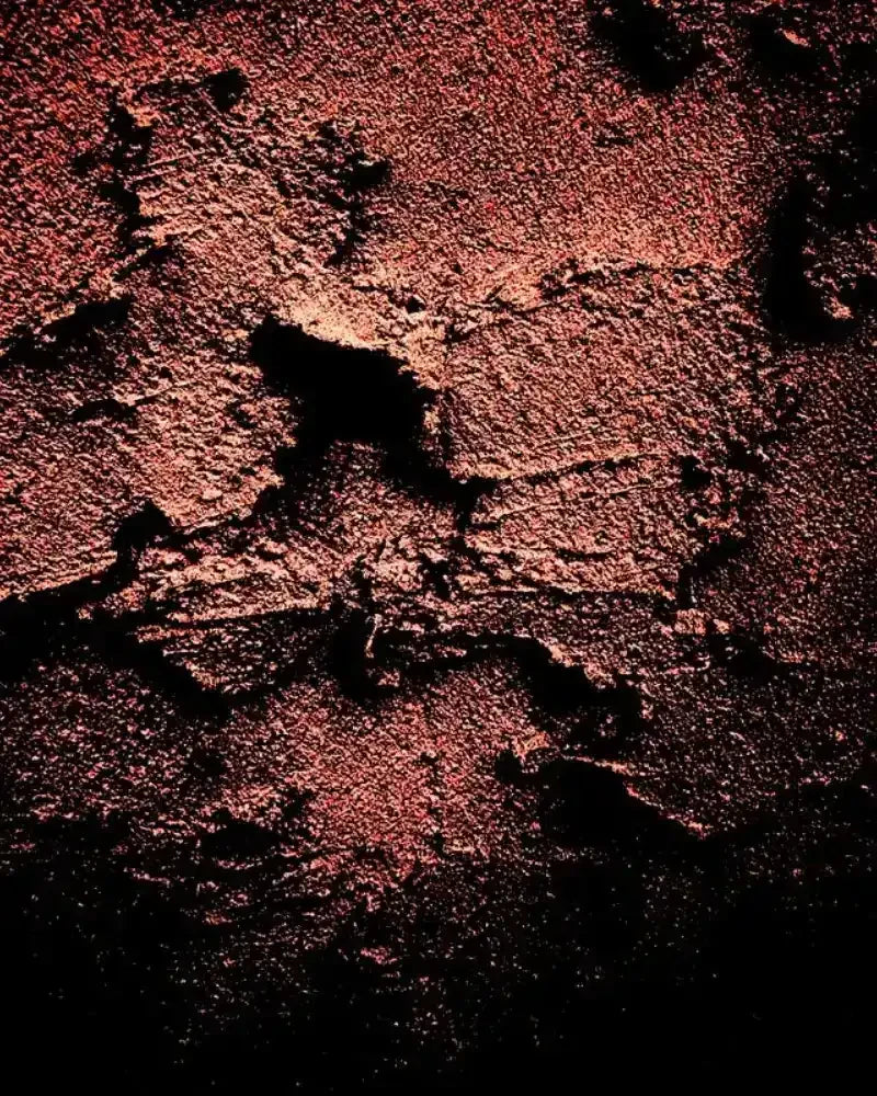 Rustic textured wall with deep red and black tones, abstract art print