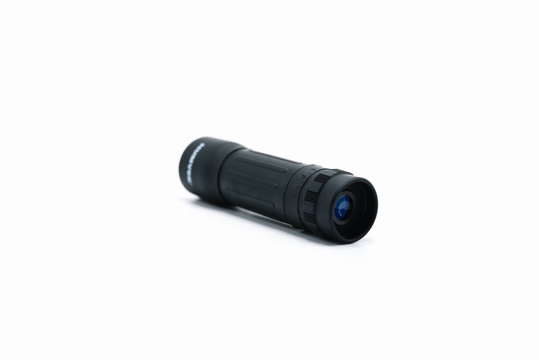 Black monocular telescope on a white background