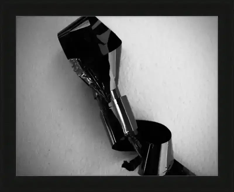 Black and white abstract photo of crumpled metallic object in frame, modern art print