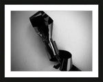 Black and white framed print of abstract metallic sculpture with reflective surfaces