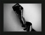 Black and white abstract sculpture print in black frame, modern art wall decor