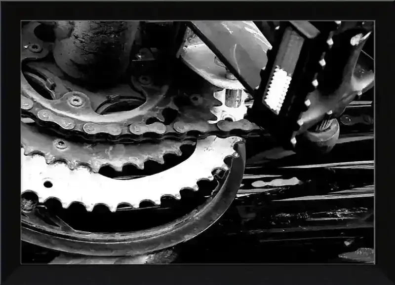 Black and white framed print of vintage bicycle gears and chain, industrial mechanical detail