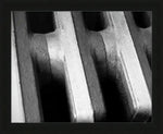 Black and white close-up of textured metal radiator fins, framed print