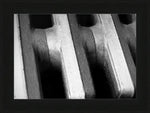 Black and white close-up of vintage radiator fins, textured metal details, framed art print
