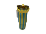 Striped tumbler with yellow rim and handle on a white background