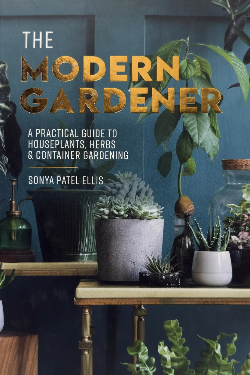 The Modern Gardener book cover with houseplants, succulents, and gardening tools on shelves