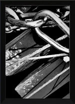 Black and white framed print of intertwined metal chains and industrial textures, USA-made frame