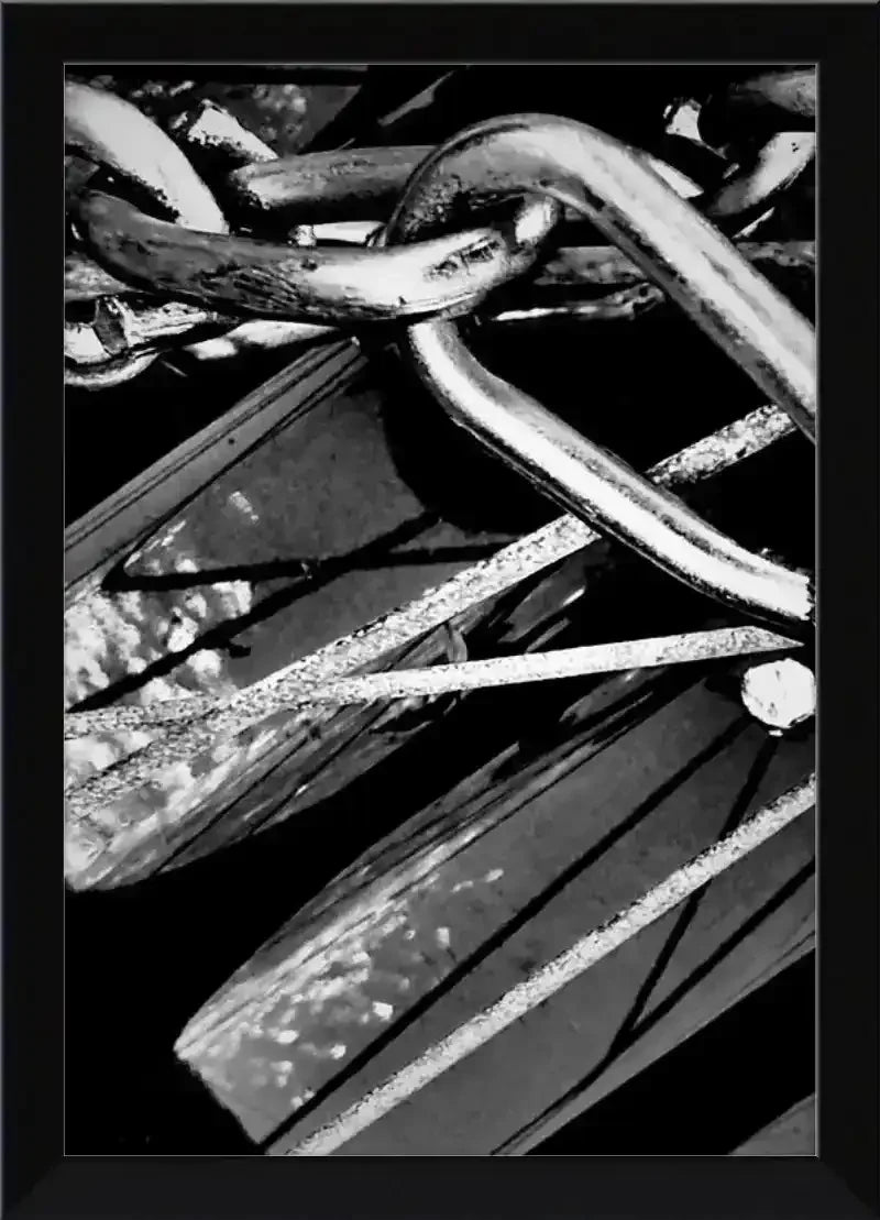 Black and white framed print of intertwined metal chains and industrial textures, USA-made frame