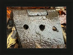 Rusty antique metal hinge with weathered texture, surrounded by autumn leaves, framed print
