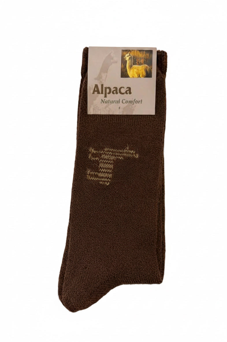 Brown alpaca sock with label on a beige background