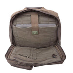 Open olive green tactical backpack interior with padded laptop sleeve and multiple compartments