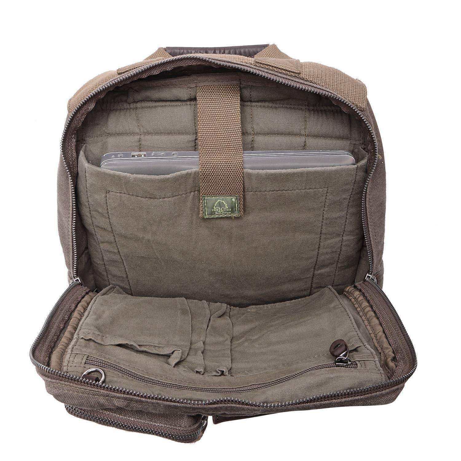 Open olive green tactical backpack interior with padded laptop sleeve and multiple compartments