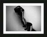Black and white abstract photo of reflective chrome pipes in a frame, modern industrial art print
