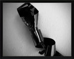 Black and white abstract photo of crumpled reflective material in a frame, modern graphic art print