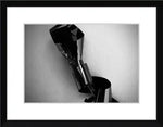 Black and white framed print of abstract metallic sculpture with reflective surfaces