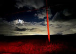 Moonlit night sky with dramatic clouds, red-lit utility pole, and dark field—natural world photography print