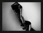 Black and white abstract sculpture print in black frame, modern art photography