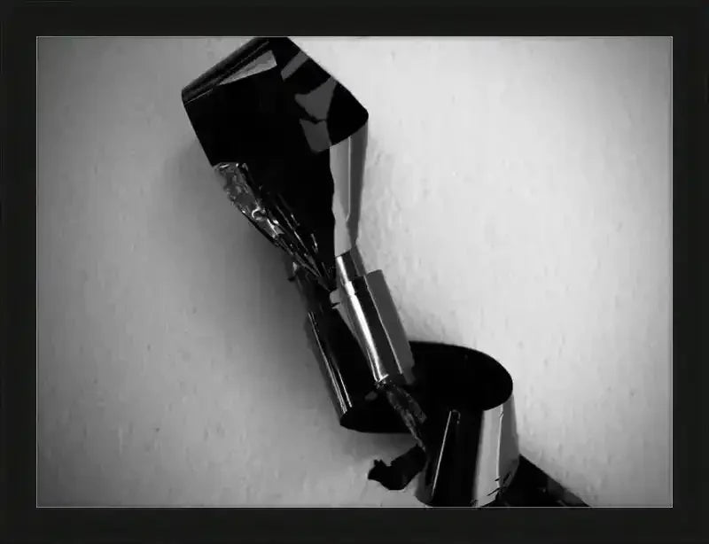 Black and white abstract sculpture print in black frame, modern art photography