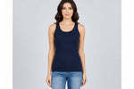 Woman wearing navy ribbed tank top and blue jeans