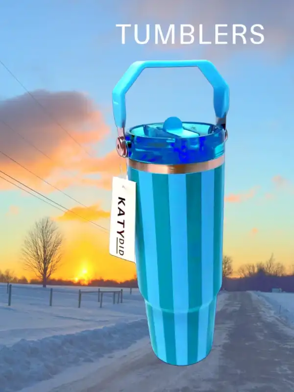  Tumbler Cabana 30 oz Tumbler Blue with handle against a sky background Tumblers