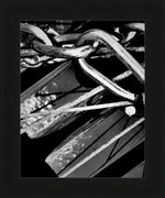Black and white framed print of intertwined metal chains and industrial textures, USA-made frame