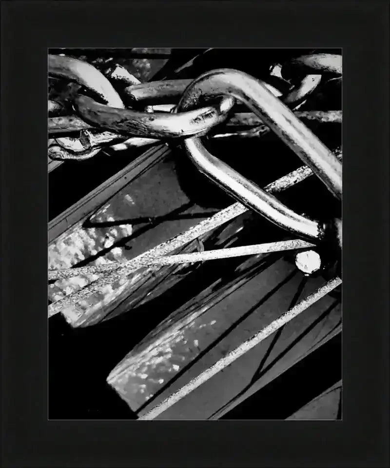 Black and white framed print of intertwined metal chains and industrial textures, USA-made frame
