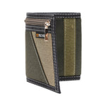Green and brown wallet with a visible brand logo on a white background