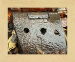 Rusty antique hinge on autumn leaves, textured metal with three holes, nature photography print