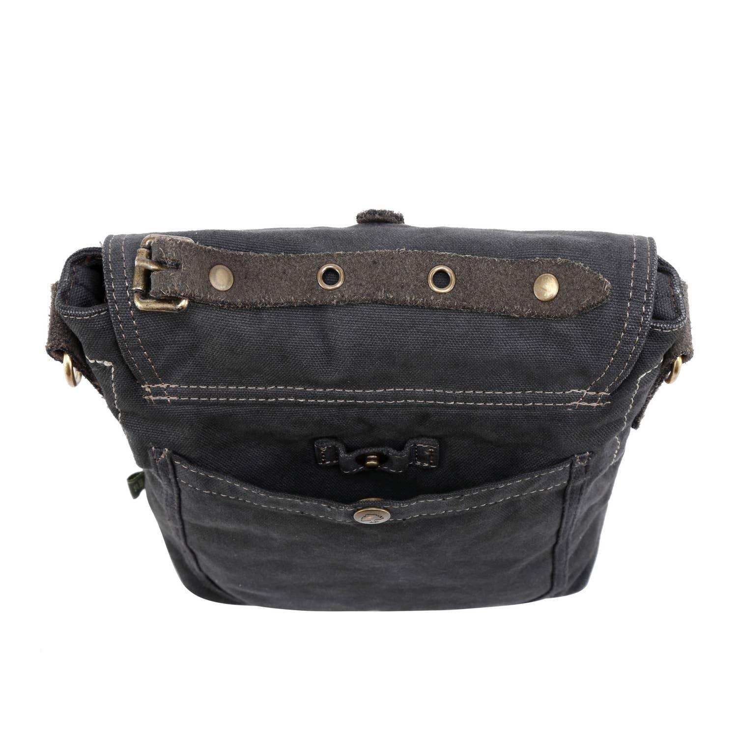 Black leather bag with brass hardware on a white background