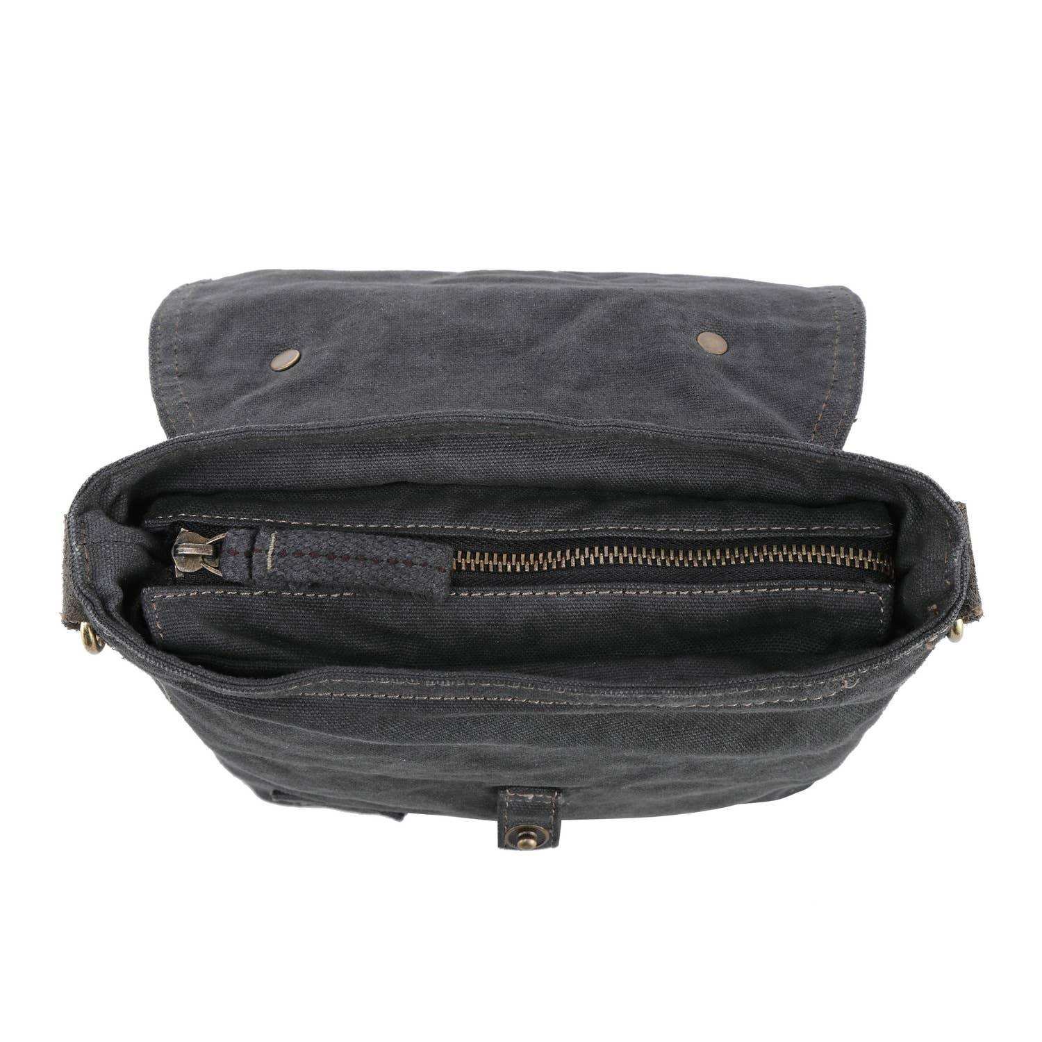 Black leather bag with open flap on a white background