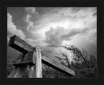 Dramatic black and white storm sky with lightning over rustic wooden beam, framed print