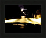Night driving scene with glowing headlights on wet road, framed print