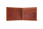 Brown leather wallet open on a white background