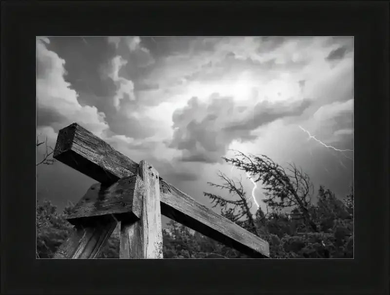 Black and white storm photo with lightning over wooden fence, framed print